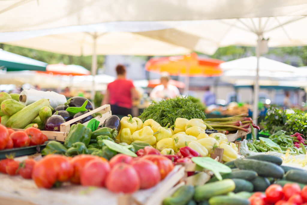 Fresh local produce at an outdoor farmers market